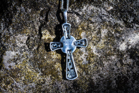 Back view of Cross Pendant sitting on stone surface. Silver Cross Necklace, Cross Memorial Jewlery, Silver Necklace for Ash, Silver Jewelry for Ash, Memorial Jewelry, Religious Jewelry for Ash