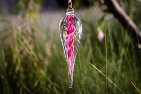 glass dewdrop with cremation ash