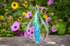 memorial glass flame with cremation ashes