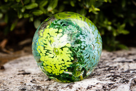 glass orb with cremation ash