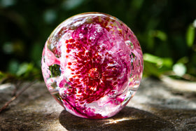 glass orb with cremation ash