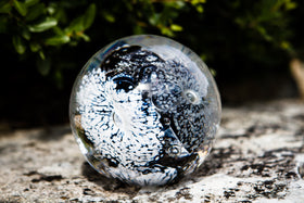 glass orb with cremation ash