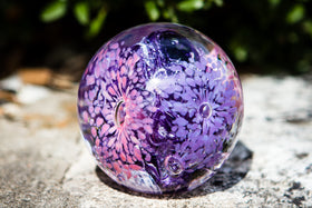 glass orb with cremation ash