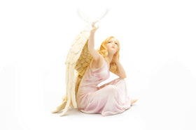 angel with dove figurine