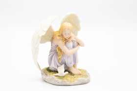 sitting angel with dove for urns