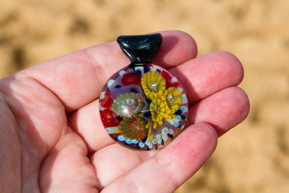 Atlantic Coral Reef glass pendant containing cremains within colorful coral polyps; each piece is unique.
