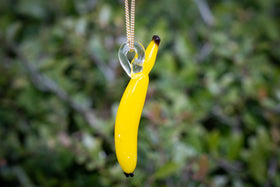 glass banana with ashes