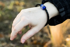 barrel bracelet for cremation ash on hand in blue