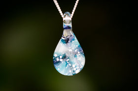 blue spiral pendant with cremation ash