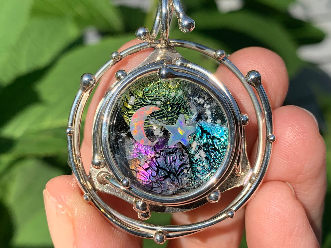 Caged rainbow galaxy pendant with opal cabochon infused with cremation ashes