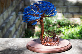 colorful tree of life memorial by brenda made of wire and wood base