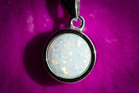 cremation jewelry with with opal and cremation ash