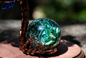 glass cremation orb made with cremation ash - emerald style
