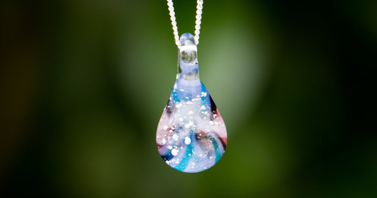 cremationjewelrypendantblueswirlwithcremationash.jpg?crop=center&height