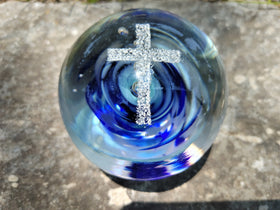 cross with cremation ash and orb