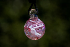 dichroic ball with cremation ash in red
