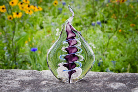 memorial glass flame with cremation ashes