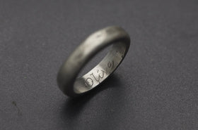 engraved ring with cremation ash