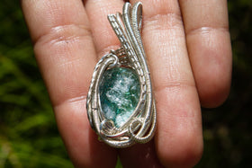 Wire wrapped glass pendant with cremation ash