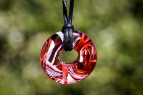 halo pendant with cremation ash in red