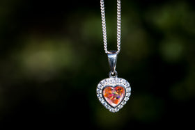 bedazzled heart pendant with cremation ash
