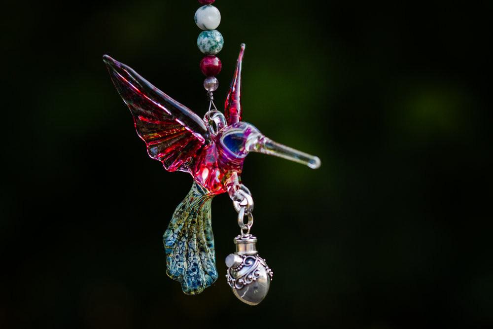 Pink and tree agate bead necklace with a red winged hummingbird and crystal butterfly and a detachable keepsake urn.