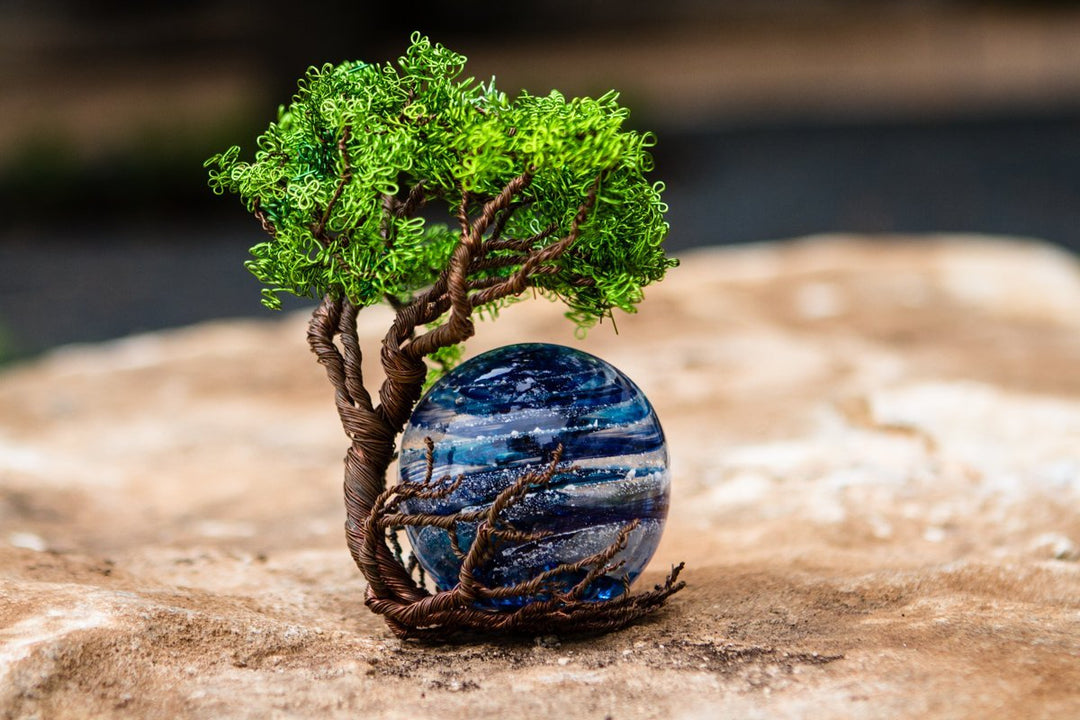 Ponderosa Tree of Life wire sculpture with a 3 inch Sparkle Orb on a wooden stand