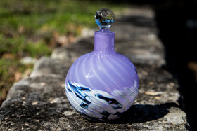 purple spin keepsake urns with ash