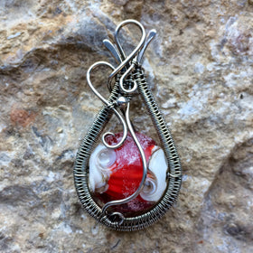 Wire wrapped alien world cremation jewelry