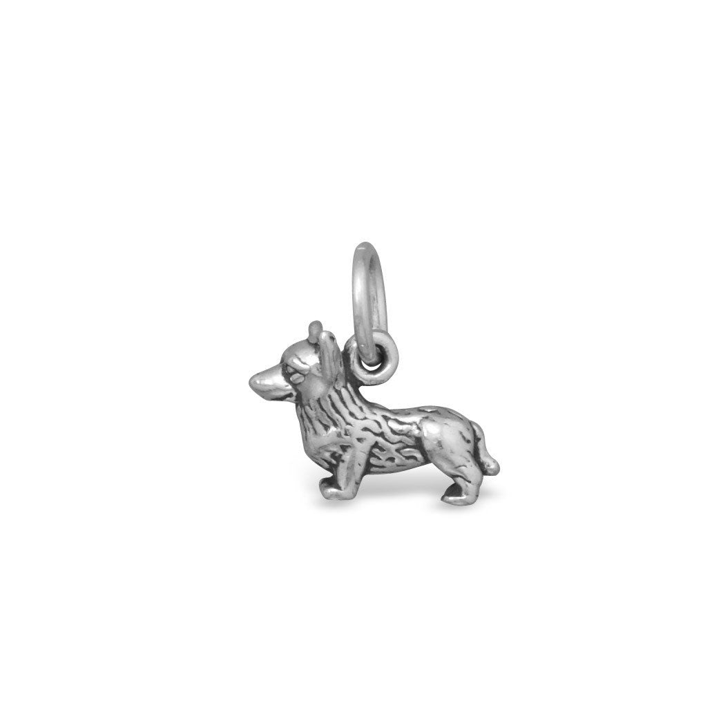 Oxidized sterling silver corgi charm in standing pose with textured fur, 11.5mm by 14mm, for bracelets or necklaces.