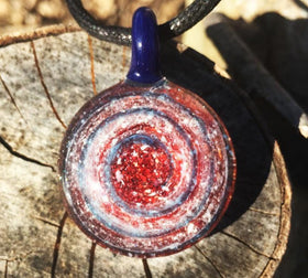 spiral glass pendant with ash