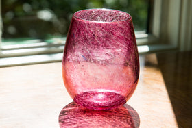 stemless wine glass with cremation ash