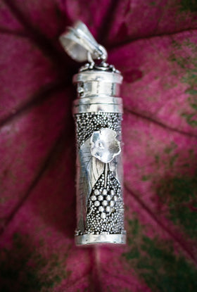 Silver Keepsake Pendant With Flower