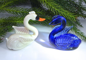 swans with cremation ash