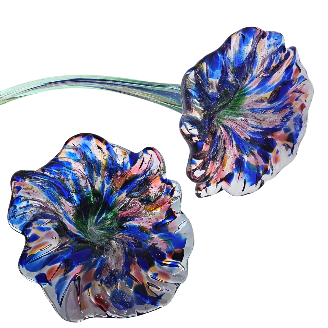 vibrant glass flower with cremation ash blue