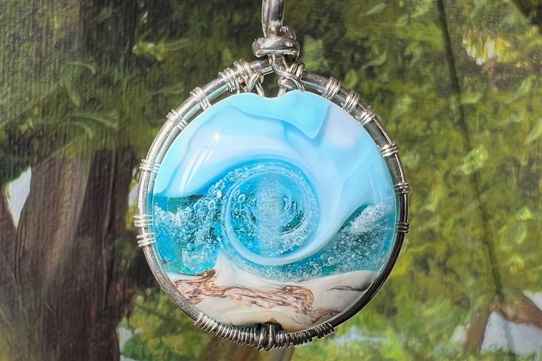 Large round Ocean Sunrise Tree of Life pendant in sterling silver with cremains visible on both sides